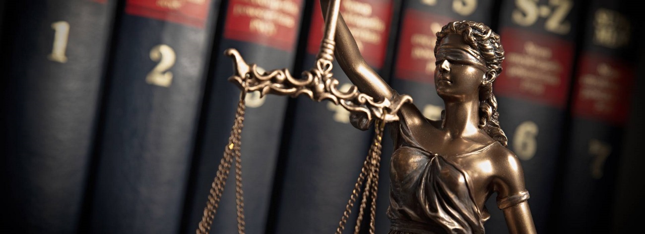 Lady Justice with a set of scale - Link to Canadian IP litigation 2024: a year in review