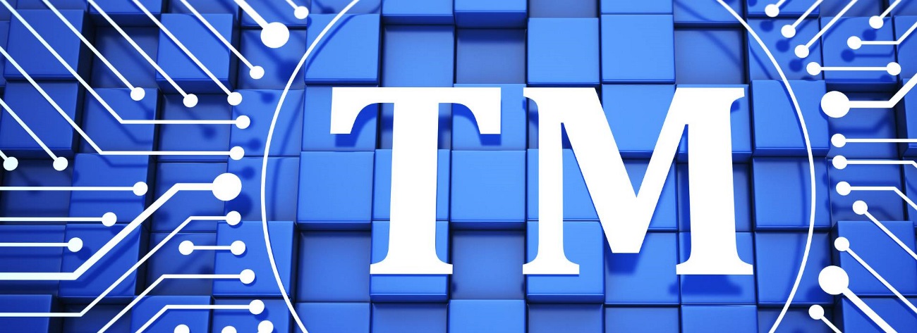 Trademark symbol on a blue background - Link to Canadian trademark law 2024: a year in review